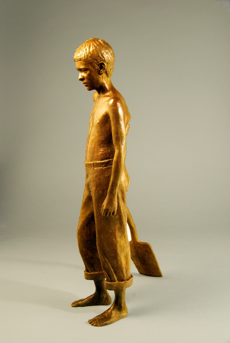 Realistic bronze sculpture of a boy with spade in a garden, 14 inches high
